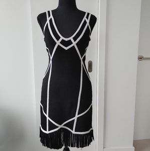 Body Con black dress with slimming detailing